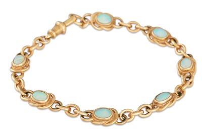 Lot 104 - AN OPAL SET BRACELET, mounted in 9ct yellow...