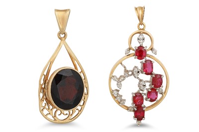 Lot 107 - TWO 18CT GOLD PENDANTS, one garnet set and one...