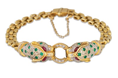 Lot 56 - A RUBY, EMERALD & DIAMOND BRACELET, modelled...