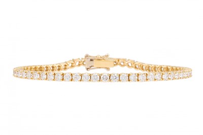 Lot 157 - A DIAMOND LINE BRACELET, the round brilliant...