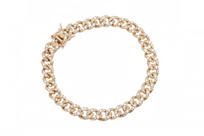 Lot 158 - A DIAMOND SET CURB LINK BRACELET, mounted in...