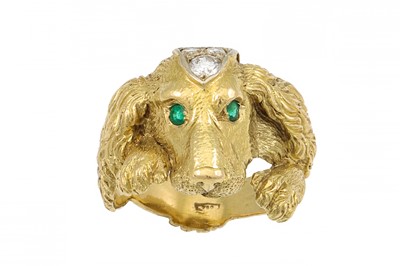 Lot 206 - A DIAMOND AND EMERALD DRESS RING, modelled as...