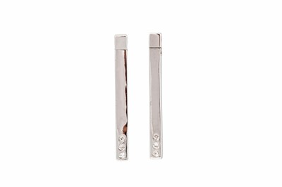 Lot 216 - A PAIR OF DIAMOND SET EARRINGS, each bar drop...