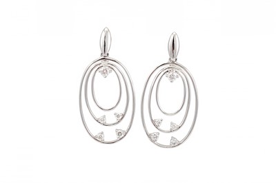 Lot 230 - A PAIR OF DIAMOND DROP EARRINGS, of circular...