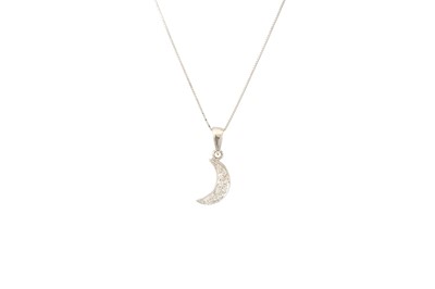 Lot 231 - A DIAMOND PENDANT, half moon shape on a chain,...