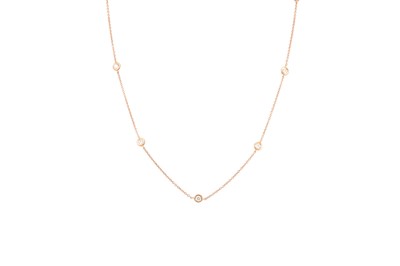 Lot 234 - A DIAMOND SET CHAIN, the collet set brilliant...