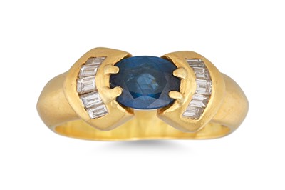 Lot 137 - A SAPPHIRE AND DIAMOND SET RING, the oval...